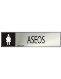 Cartel informativo "aseos" mujer (inox adhesivo 0.8mm) 5x20cm normaluz