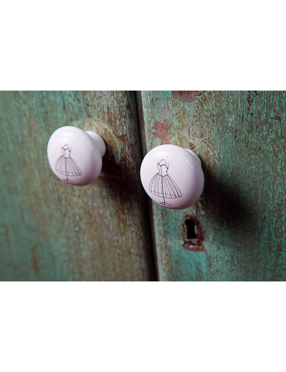 Blister con 4 pomos redondos para mueble fabricado en porcelana acabado ilustrado mod. e817 ø40mm rei