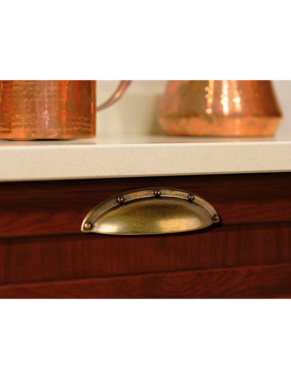 Blister con 4 tiradores tipo concha fabricado en zamak acabado cuero viejo mod. 2004 entrepuntos 64mm rei